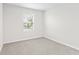 Spacious bedroom with neutral walls and carpet at 4701 New Orleans Cv, Oviedo, FL 32765