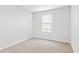 Bright bedroom with neutral walls and carpet at 4701 New Orleans Cv, Oviedo, FL 32765