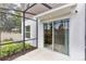 Screened patio with sliding glass doors at 4701 New Orleans Cv, Oviedo, FL 32765