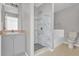 Bathroom with a walk-in shower and separate tub at 610 Crane Dr, Poinciana, FL 34759