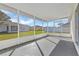 Spacious screened patio overlooking the backyard at 610 Crane Dr, Poinciana, FL 34759