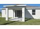 Covered patio with sliding glass doors, extending the living space outdoors at 6116 Success Way, St Cloud, FL 34771