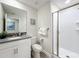 Clean bathroom with shower, toilet, and modern vanity at 1264 Challenge Dr, Davenport, FL 33896