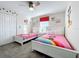 bedroom with two twin beds and Disney decor at 1264 Challenge Dr, Davenport, FL 33896