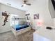 Bunk beds, Marvel themed decor, and a small desk make this a fun ' room at 1264 Challenge Dr, Davenport, FL 33896