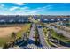 Gated community entrance with palm trees and landscaping at 1264 Challenge Dr, Davenport, FL 33896