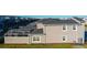 Modern two-story townhome with stone accents and a private backyard at 1264 Challenge Dr, Davenport, FL 33896