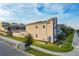 Modern two-story townhome with stone accents and a private backyard at 1264 Challenge Dr, Davenport, FL 33896