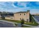 Modern two-story townhome with stone accents and a private backyard at 1264 Challenge Dr, Davenport, FL 33896