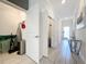 Bright foyer with tile floors and access to coat closet at 1264 Challenge Dr, Davenport, FL 33896