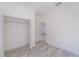 Spacious bedroom closet with double doors and shelving at 2416 Sw 158Th Pl, Ocala, FL 34473