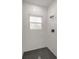 Modern bathroom with marble shower walls and hexagon floor tiles at 4479 Sw 170Th Rd, Ocala, FL 34473
