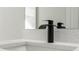 Modern bathroom faucet on vanity at 4479 Sw 170Th Rd, Ocala, FL 34473