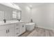 Modern bathroom with double vanity, soaking tub and walk-in shower at 4479 Sw 170Th Rd, Ocala, FL 34473