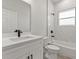 Modern bathroom with white vanity, marble tile, and bathtub at 4479 Sw 170Th Rd, Ocala, FL 34473