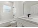 Updated bathroom with white vanity, quartz countertop, and black fixtures at 4479 Sw 170Th Rd, Ocala, FL 34473