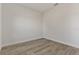 Simple bedroom with neutral walls and wood-look floors at 4479 Sw 170Th Rd, Ocala, FL 34473