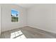 Bright bedroom with hardwood floors and large window at 4479 Sw 170Th Rd, Ocala, FL 34473