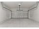 Spacious garage with automatic opener and clean concrete floor at 4479 Sw 170Th Rd, Ocala, FL 34473