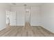 Light and airy hallway with vinyl flooring and access to other rooms at 4479 Sw 170Th Rd, Ocala, FL 34473