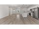Modern kitchen with white cabinets, stainless steel appliances and island at 4479 Sw 170Th Rd, Ocala, FL 34473