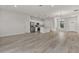 Open concept kitchen and dining area with an island and stainless steel appliances at 4479 Sw 170Th Rd, Ocala, FL 34473