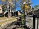 View of community grounds with walkway and pool access at 5466 Pine Creek Dr # 2002, Orlando, FL 32811