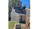 Exterior view of a contemporary condo with unique architectural details at 5466 Pine Creek Dr # 2002, Orlando, FL 32811