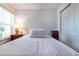 Bedroom with full bed and window at 591 Preserve Pointe Blvd, Davenport, FL 33837