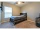 Bedroom with full bed, window, and ceiling fan at 591 Preserve Pointe Blvd, Davenport, FL 33837