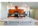Kitchen with stainless steel appliances and wood cabinets at 591 Preserve Pointe Blvd, Davenport, FL 33837