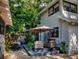 Inviting backyard with patio furniture and a dining area at 705 E Pine St, Orlando, FL 32801