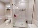 Clean bathroom with a tiled shower and updated fixtures at 705 E Pine St, Orlando, FL 32801