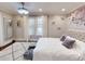 Spacious bedroom with large windows, hardwood floors, and neutral decor at 705 E Pine St, Orlando, FL 32801