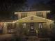 House exterior at night decorated with Christmas lights at 705 E Pine St, Orlando, FL 32801