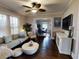 Spacious living room with hardwood floors and comfortable seating at 705 E Pine St, Orlando, FL 32801