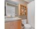 Clean bathroom with light wood vanity and shower/tub combo at 7321 Brightland St, Windermere, FL 34786