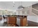 Modern kitchen with stainless steel appliances and granite countertops at 7321 Brightland St, Windermere, FL 34786