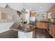 Modern kitchen with stainless steel appliances and a granite island at 7321 Brightland St, Windermere, FL 34786