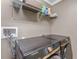 Laundry room with washer, dryer, and shelving at 7321 Brightland St, Windermere, FL 34786