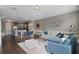 Open concept living room with kitchen and dining area views at 7321 Brightland St, Windermere, FL 34786