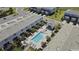 Community pool and townhomes aerial view at 856 Driving Range Ct, Reunion, FL 34747