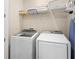 Laundry room with washer and dryer at 856 Driving Range Ct, Reunion, FL 34747