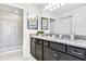 Bathroom with granite countertop double vanity at 8921 Sydney Ave, Kissimmee, FL 34747
