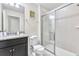 Bathroom with shower and granite vanity at 8921 Sydney Ave, Kissimmee, FL 34747