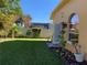 Spacious backyard with grassy lawn and privacy fence at 9111 Woodbridge Oak Ter, Orlando, FL 32825