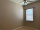 Bedroom with tile flooring, window with blinds, and ceiling fan at 9111 Woodbridge Oak Ter, Orlando, FL 32825