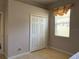 Bedroom with double-door closet, window with blinds and decorative valance at 9111 Woodbridge Oak Ter, Orlando, FL 32825