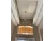 Elegant entryway with high ceilings and a chandelier at 9111 Woodbridge Oak Ter, Orlando, FL 32825