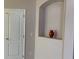 Built-in niche with decorative vase, adds character at 9111 Woodbridge Oak Ter, Orlando, FL 32825